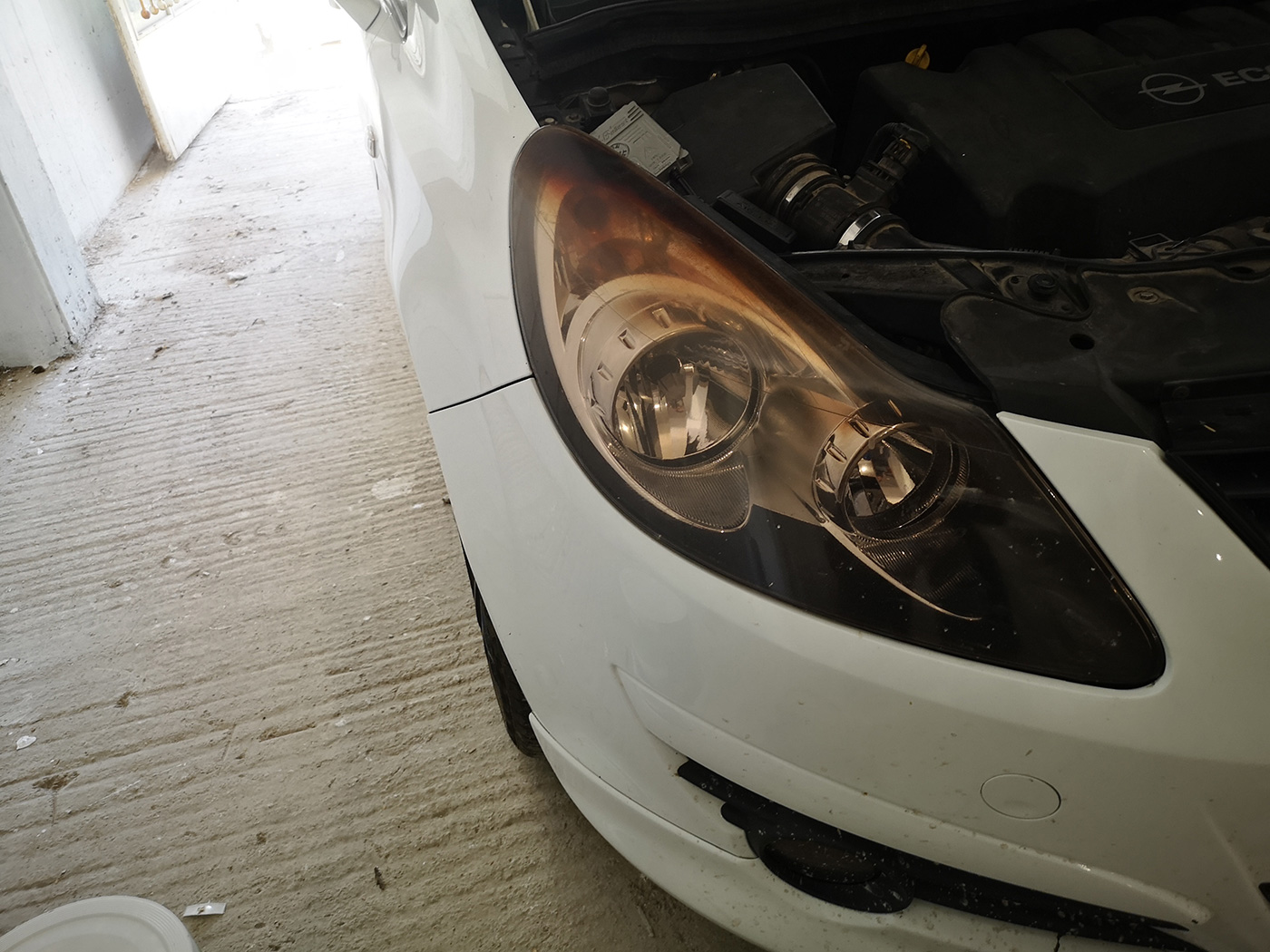 Headlight before restoration and polishing